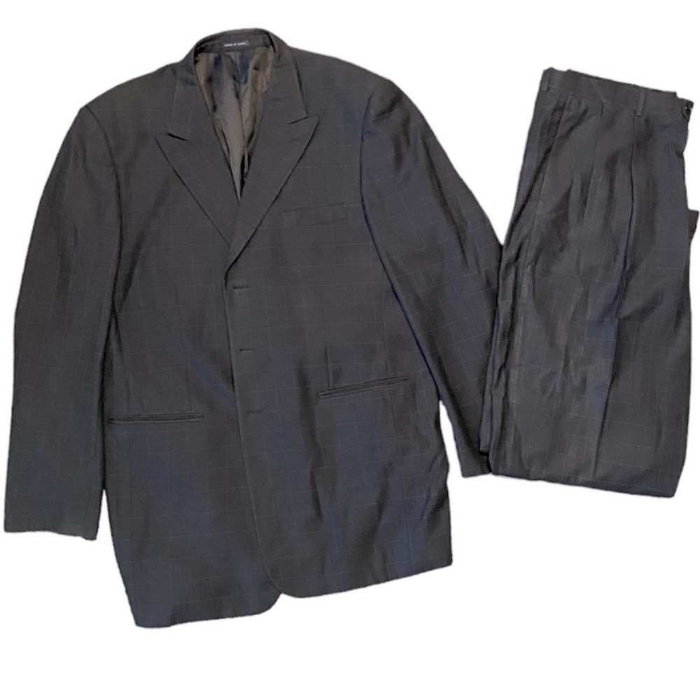 Giorgio Ferraro Super 120’s black suit with accents. Size 40 W and 46 L.